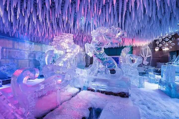 Experience the unique charm of the Chillout Ice Lounge where you can savor hot delicacies amidst stunning ice sculptures creating unforgettable moments in Dubai’s coolest destination.